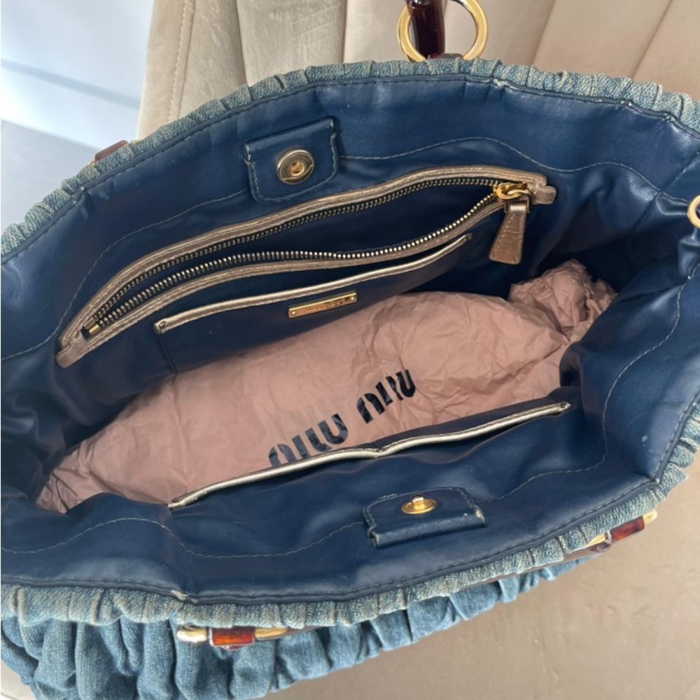 Original iconic Miu Miu style bag in jeans style that goes well with any outfit